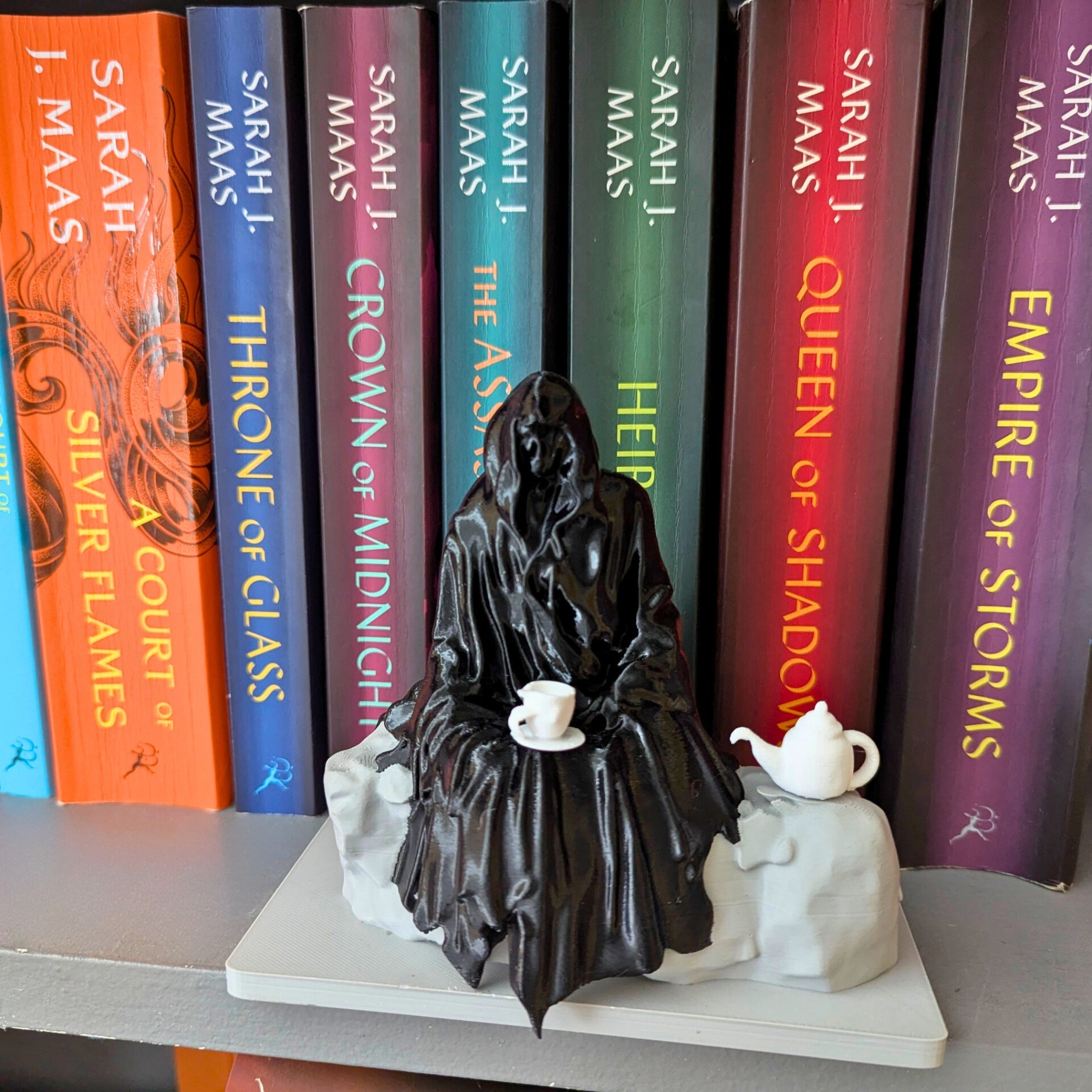 Spill the Tea Bookshelf Decor - Seated Hooded Ghost Figurine with Teacup and Tea