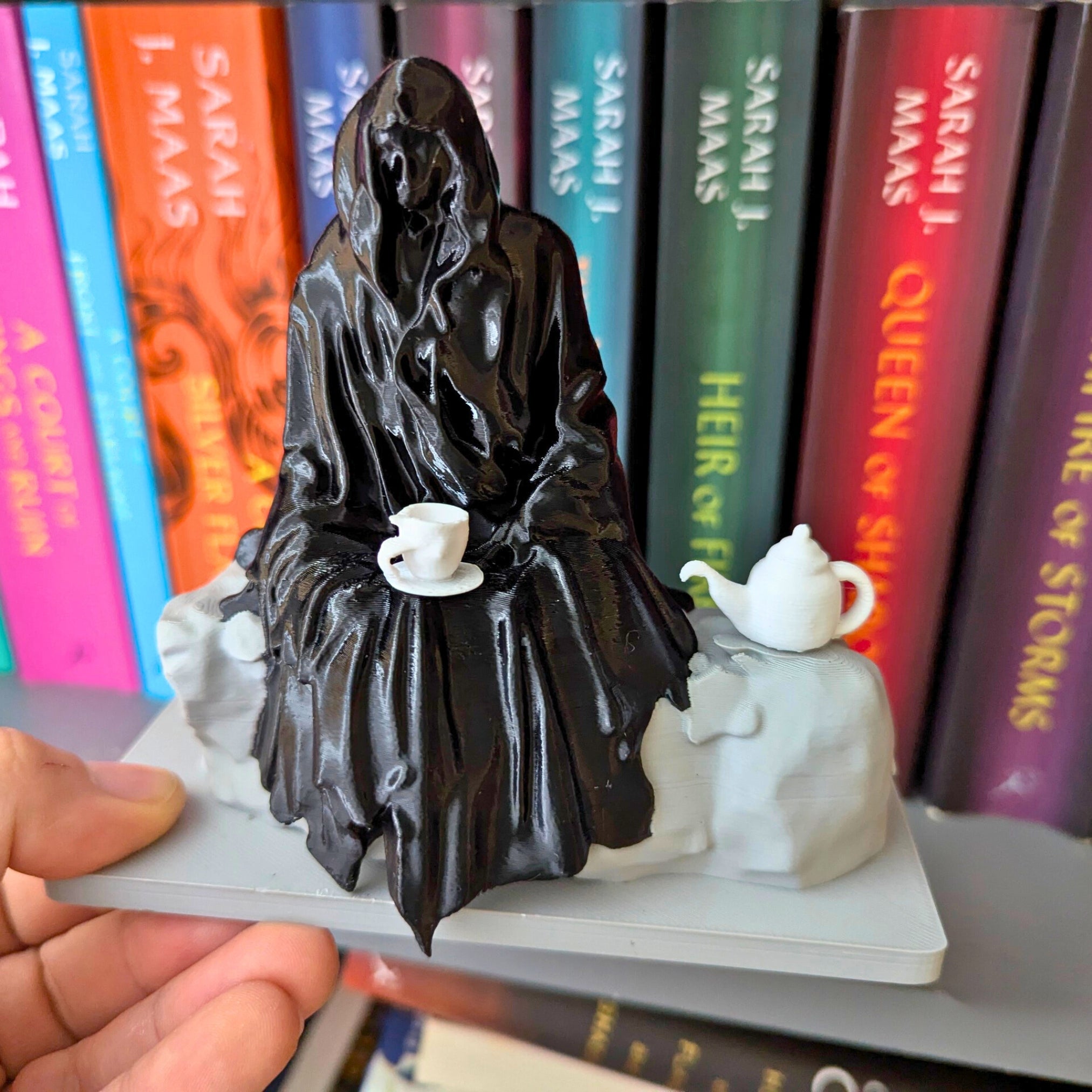 Spill the Tea Bookshelf Decor - Seated Hooded Ghost Figurine with Teacup and Tea