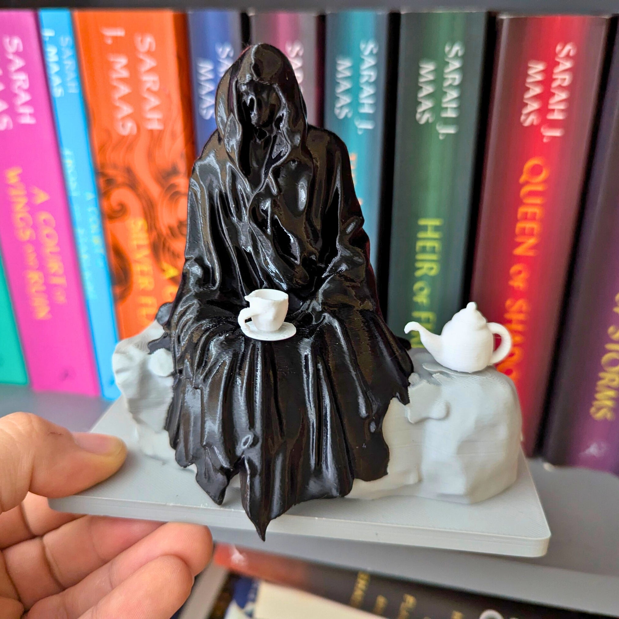 Spill the Tea Bookshelf Decor - Seated Hooded Ghost Figurine with Teacup and Tea