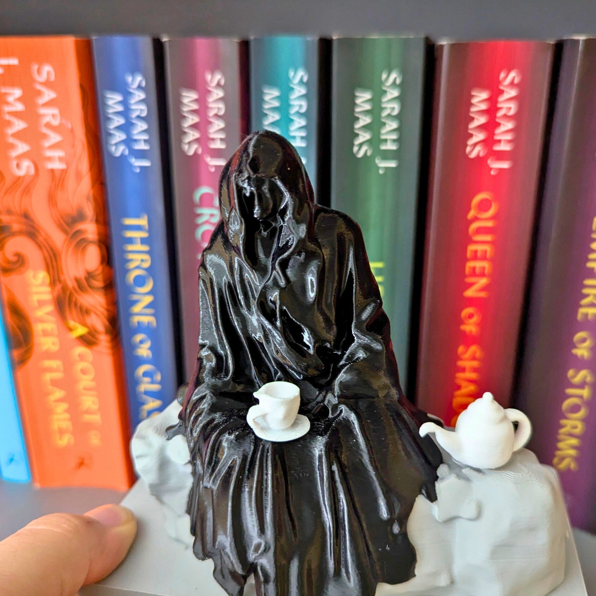 Spill the Tea Bookshelf Decor - Seated Hooded Ghost Figurine with Teacup and Tea
